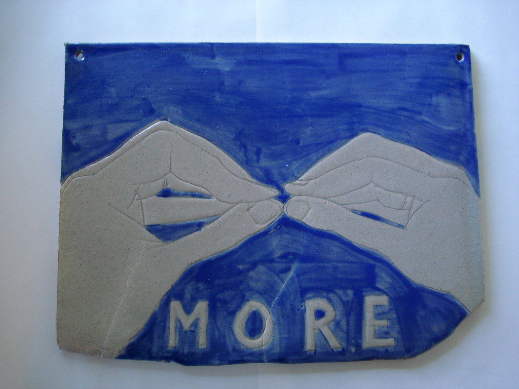 Sign language for "more" done in pottery