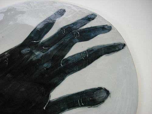 Back of hand on large platter