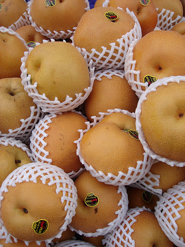 Random Asian Pears in protective sleeves