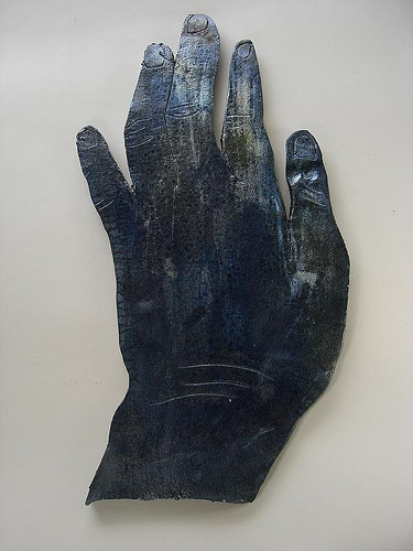 Iridescent blue raku hand