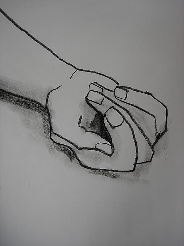 Contour drawing of a hand with shading