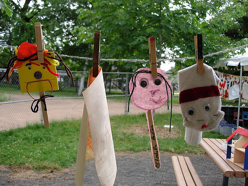 Children's puppets hanging on a clothesline