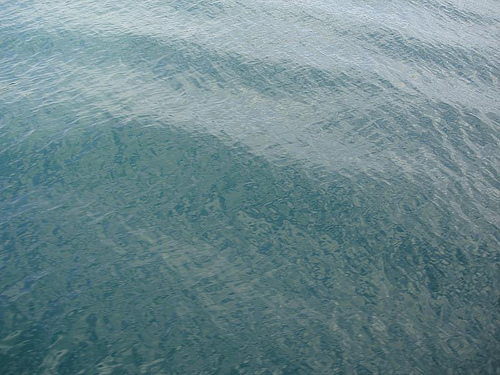 Ripples of blues on blue water